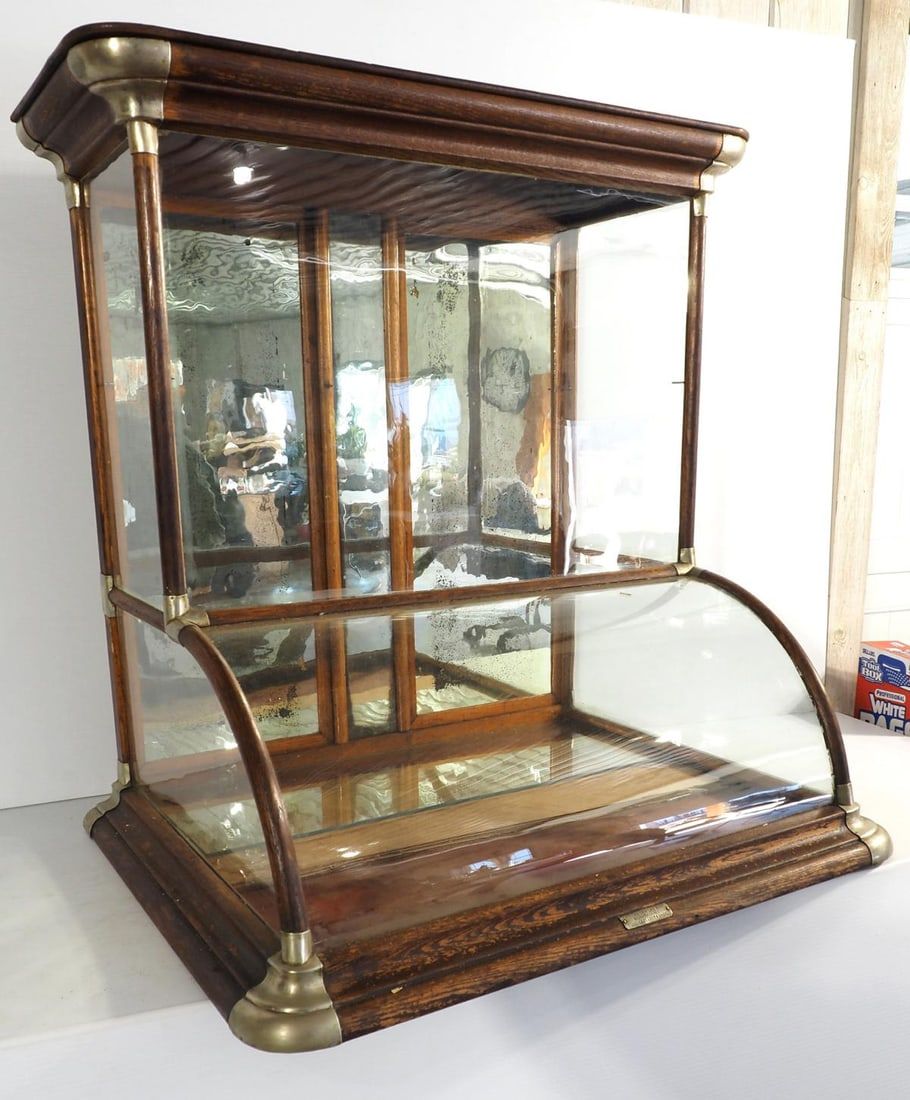 Lot 198: Wood & glass country store tower showcase