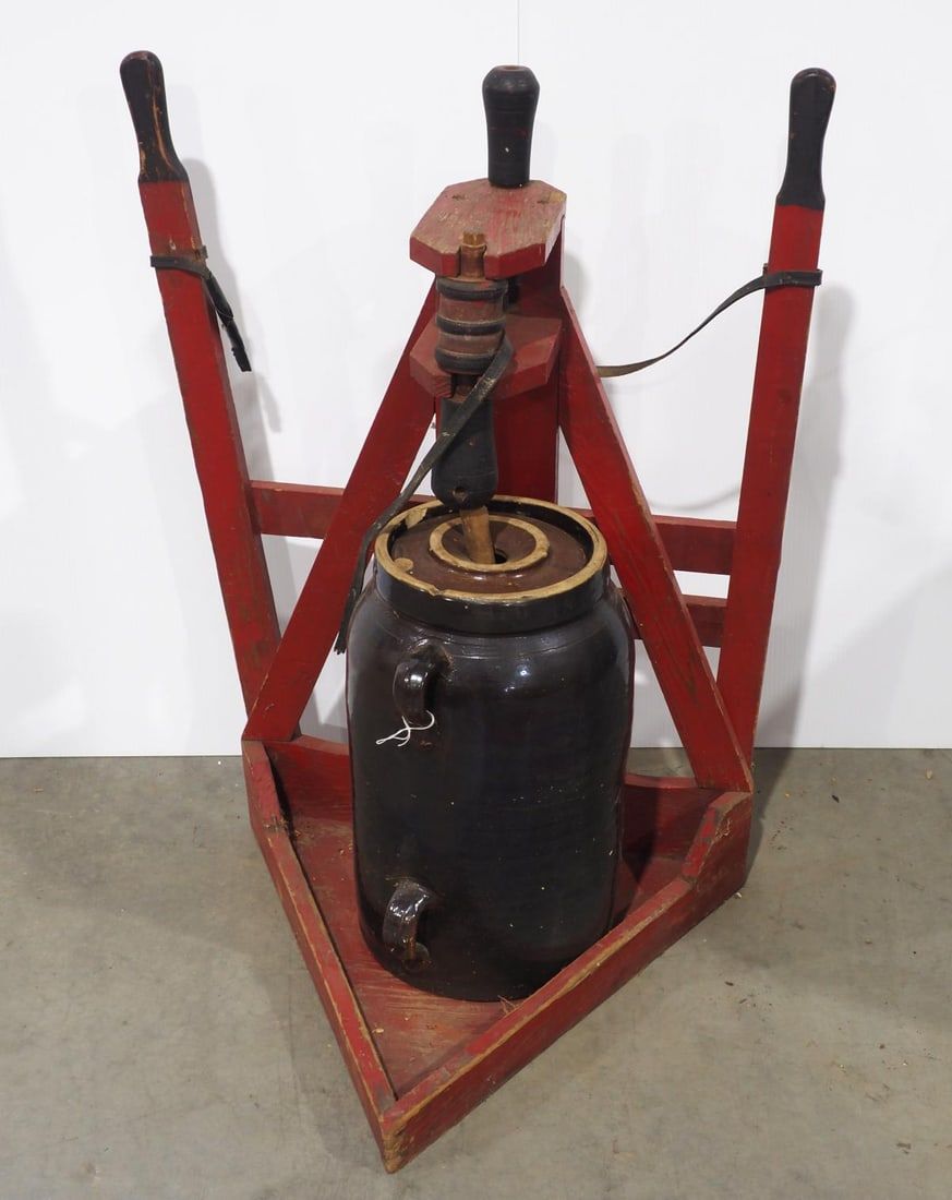 Lot 277: Early primitive hand operated butter churn