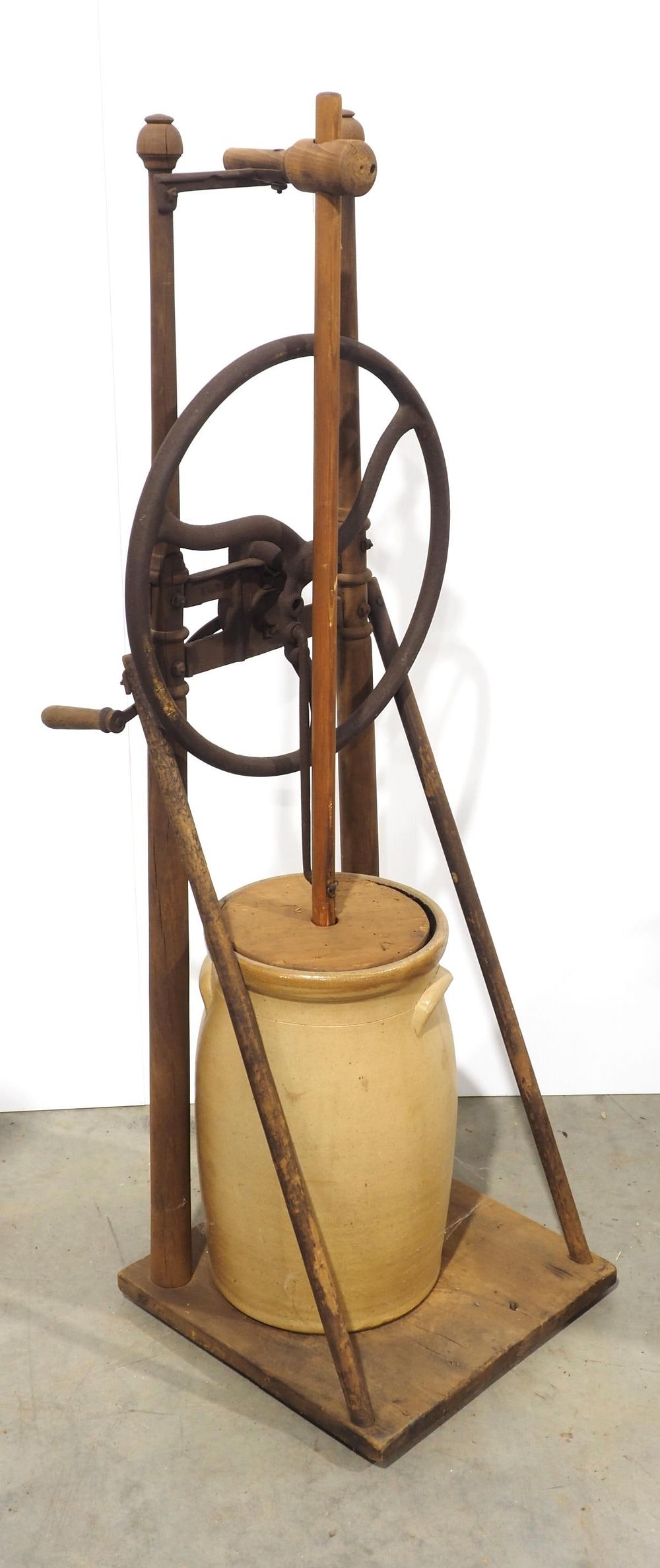 Lot 393: Unusual floor model hand-crank butter churn