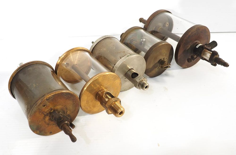 Lot 415: (5) Brass oilers