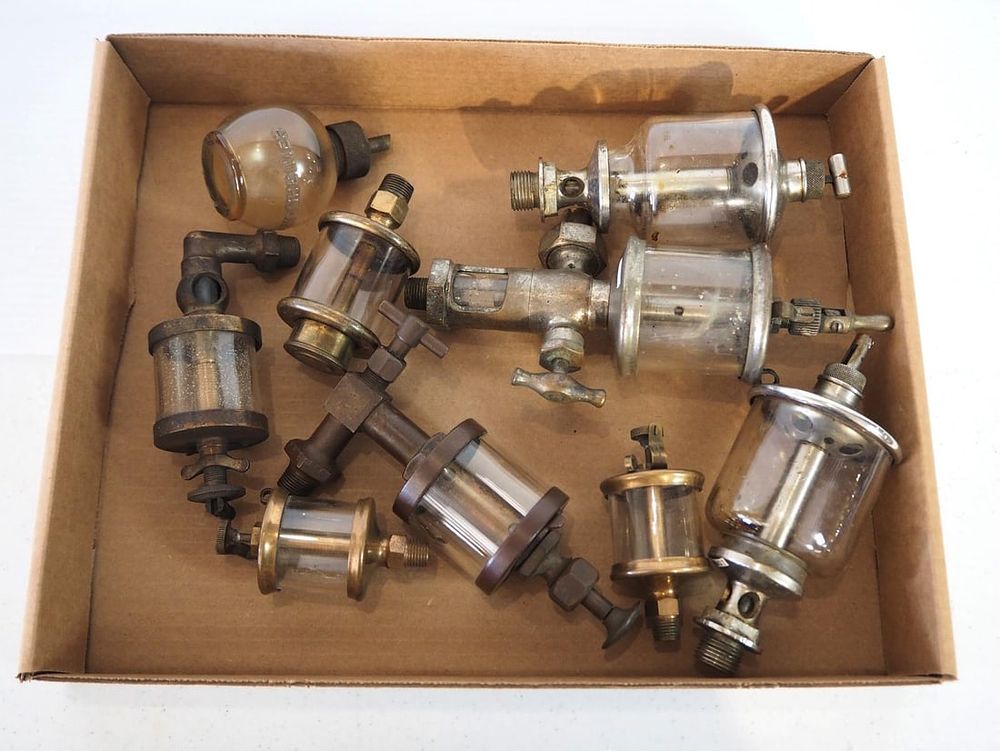 Lot 487: (9) Various oilers