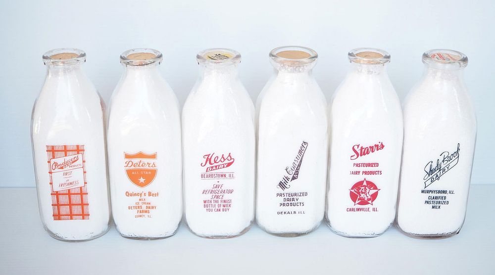 Lot 630: (6) 1 quart milk bottles
