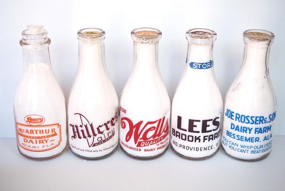 Lot 635: (5) 1 quart milk bottles