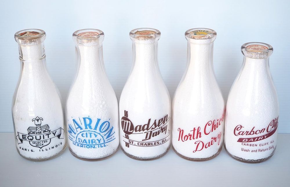 Lot 636: (5) 1 quart milk bottles