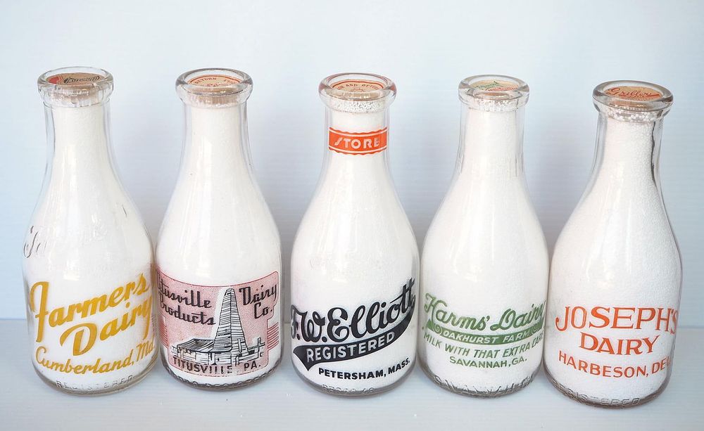 Lot 637: (5) 1 quart milk bottles