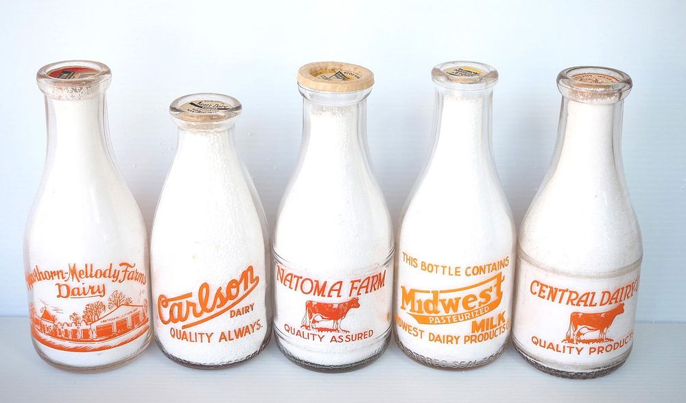 Lot 643: (5) 1 quart milk bottles