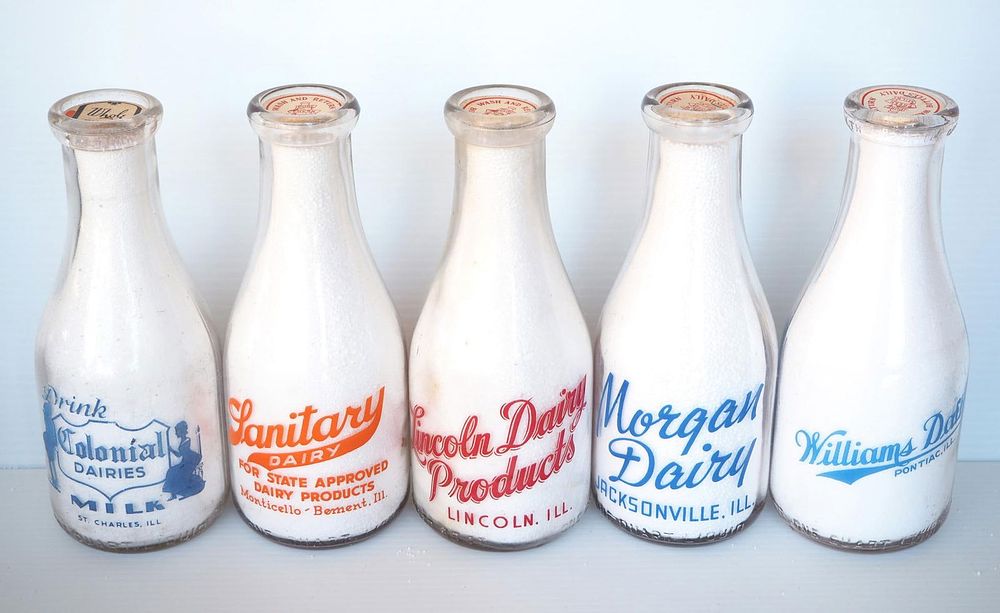 Lot 645: (5) 1 quart milk bottles
