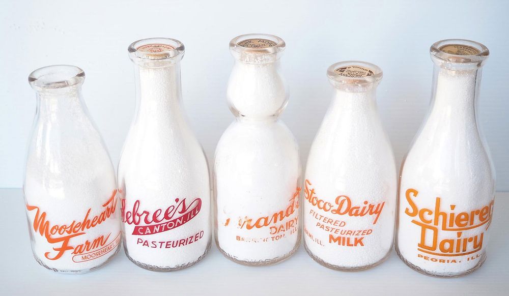 Lot 671: (5) 1 quart milk bottles