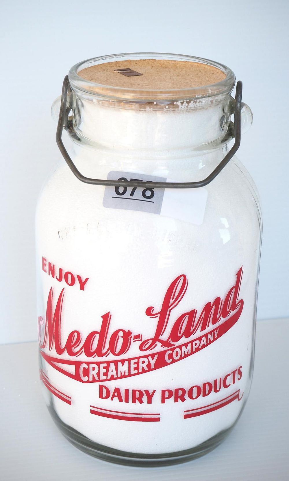 Lot 678: 1 gallon milk bottle