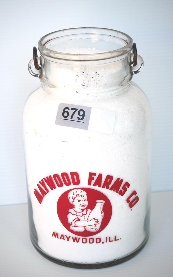 Lot 679: 1 gallon milk bottle