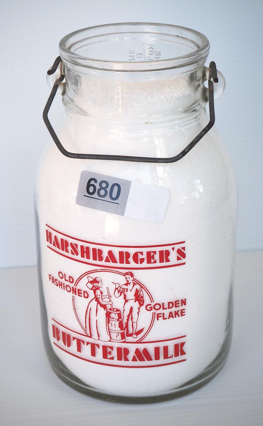 Lot 680: 1 gallon milk bottle