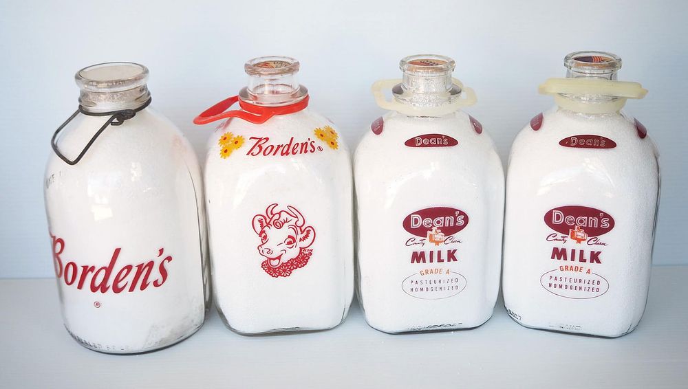 Lot 685: (4) 1 gallon milk bottles