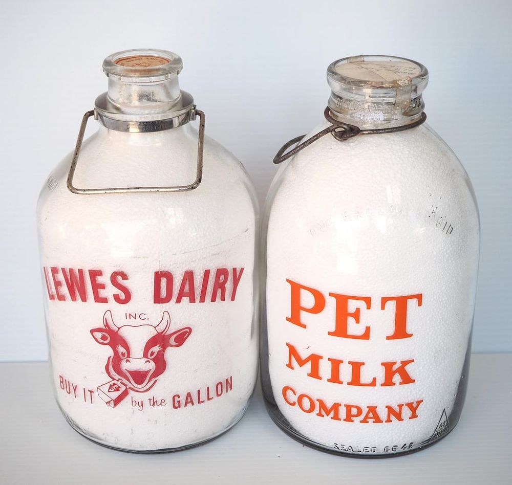 Lot 691: (2) 1 gallon milk bottles