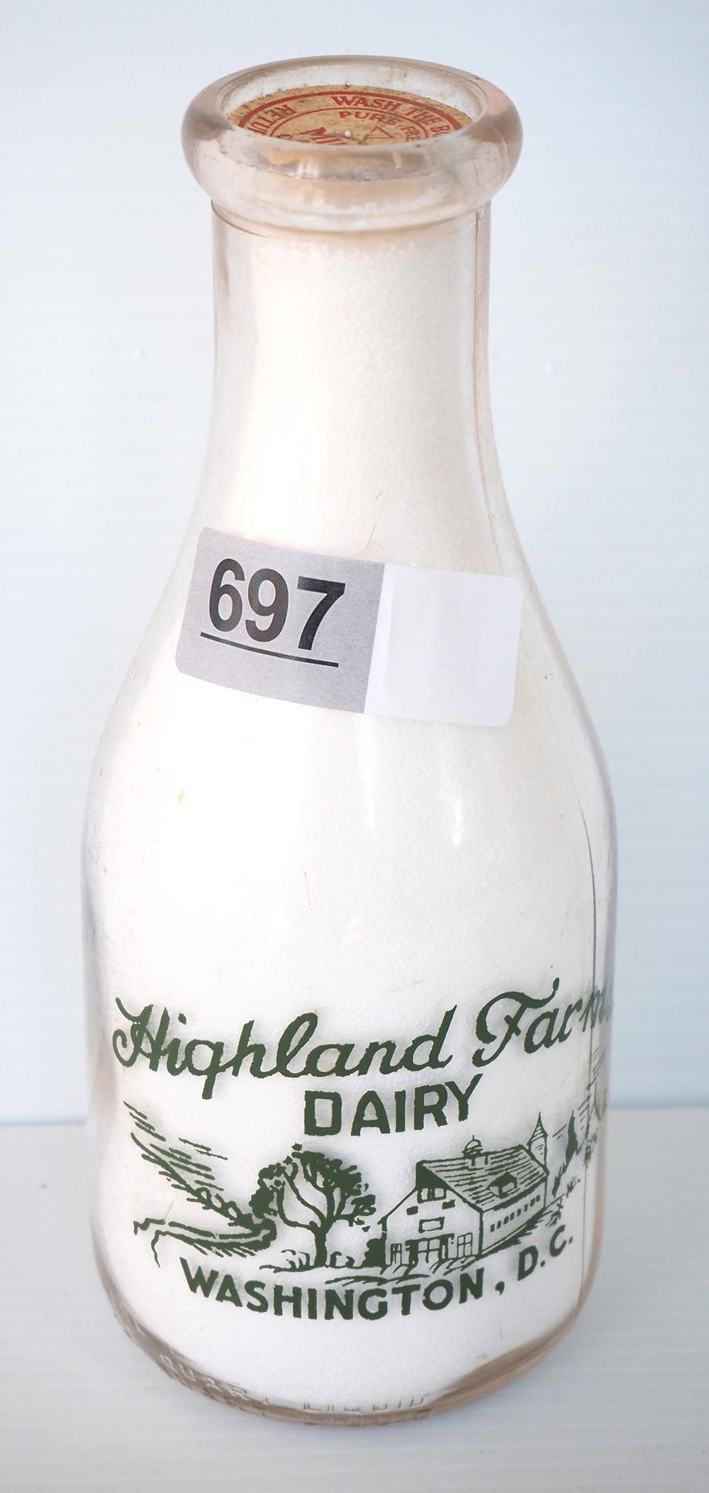 Lot 697: 1 quart milk bottle