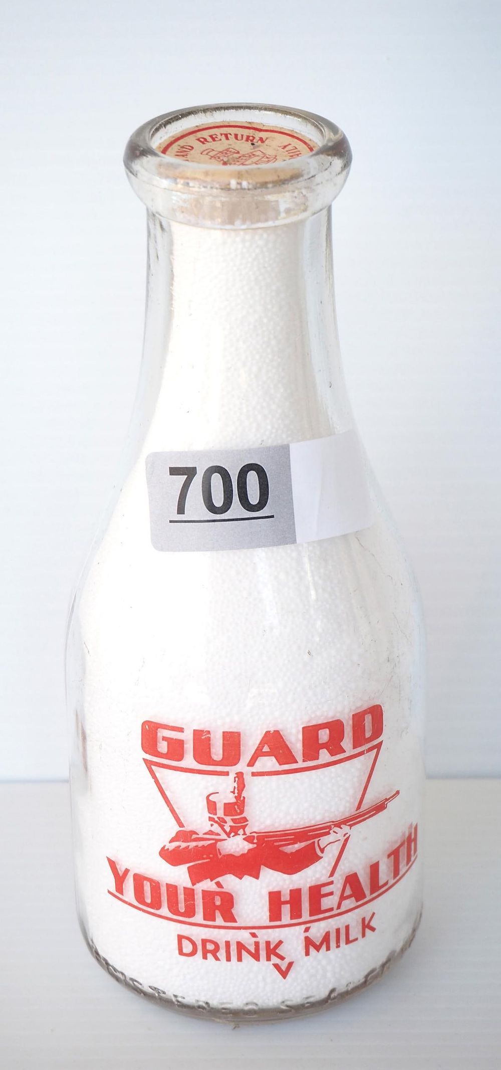 Lot 700: 1 quart milk bottle