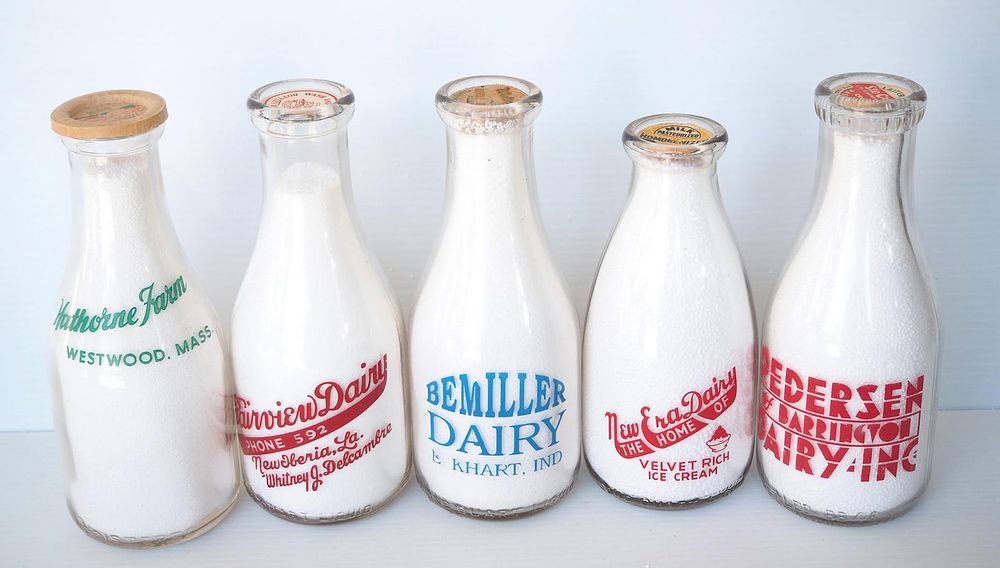 Lot 718: (5) 1 quart milk bottles