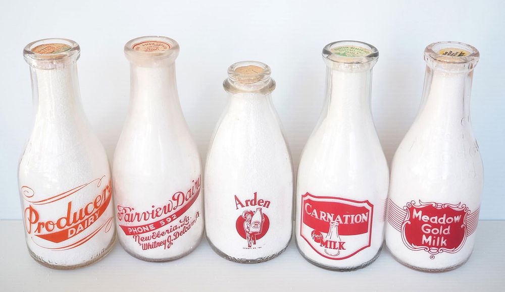 Lot 723: (5) 1 quart milk bottles