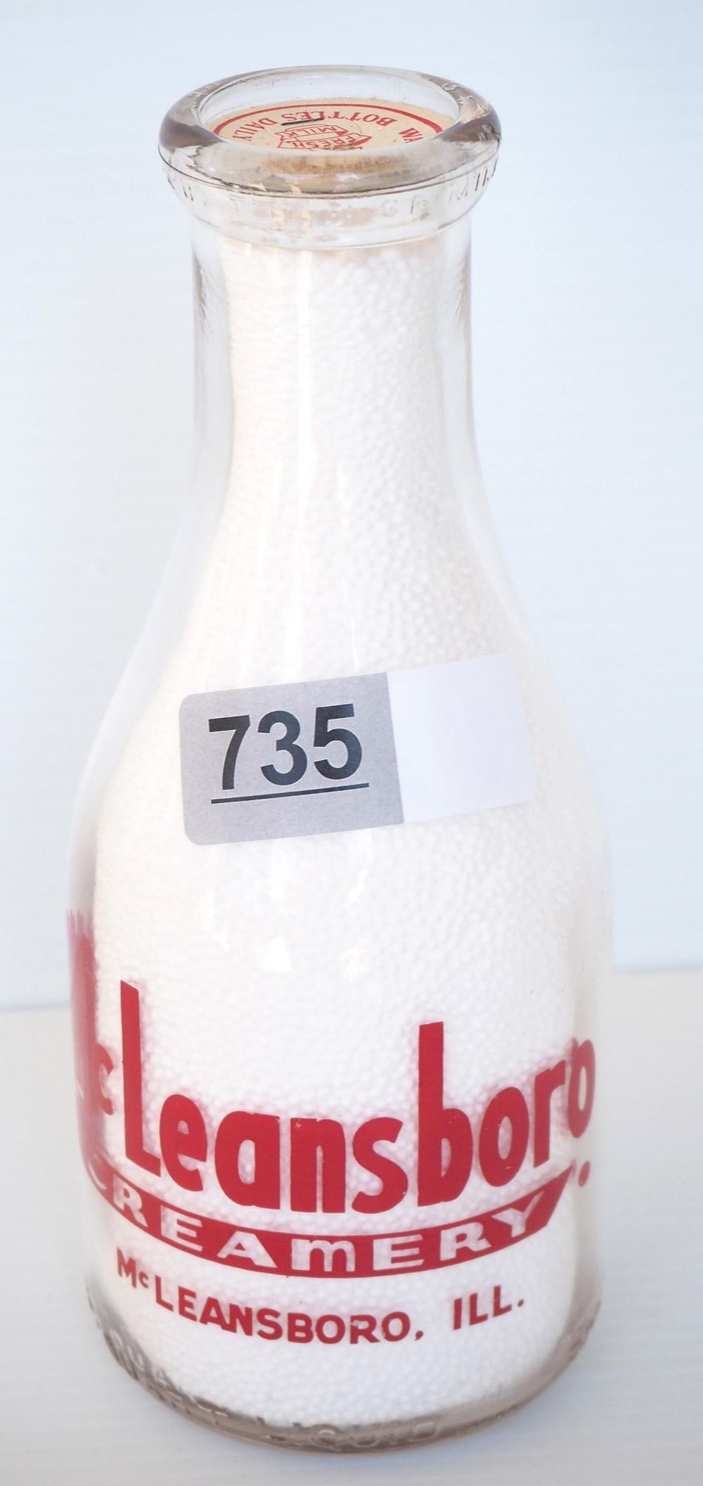 Lot 735: 1 quart milk bottle