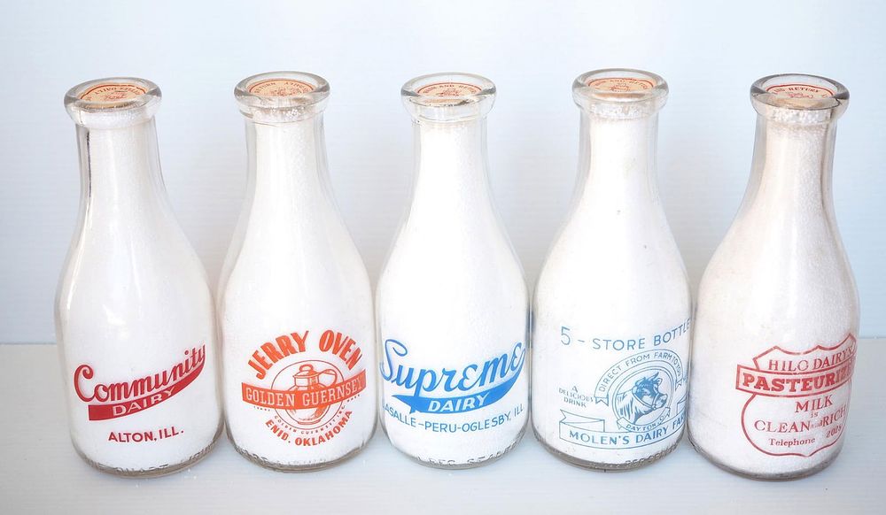 Lot 738: (5) 1 quart milk bottles