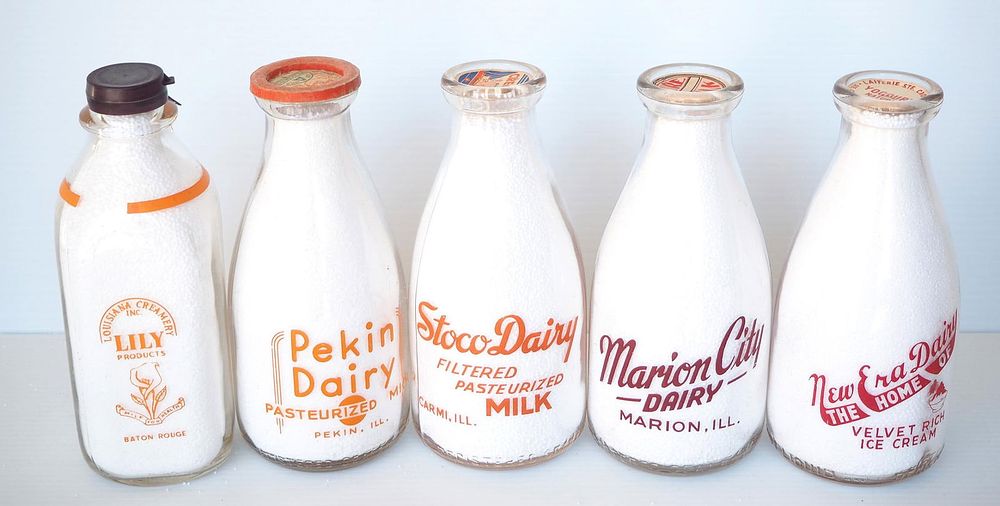 Lot 747: (5) 1 quart milk bottles