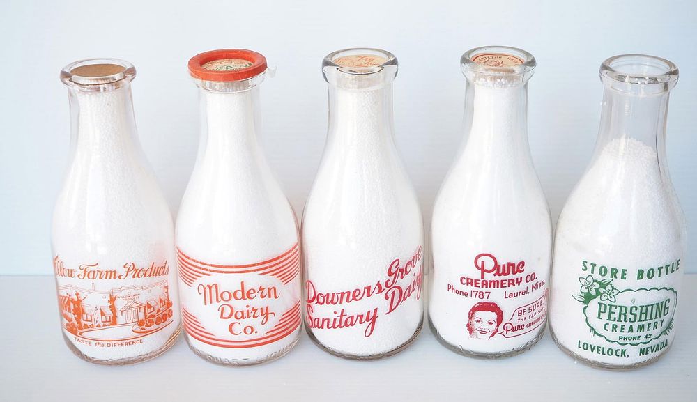 Lot 753: (5) 1 quart milk bottles
