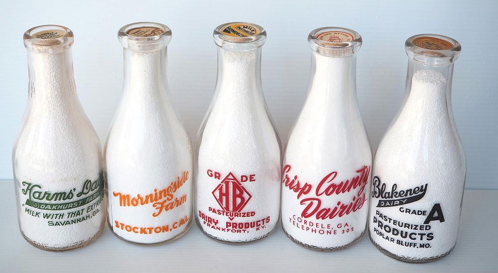 Lot 770: (5) 1 quart milk bottles