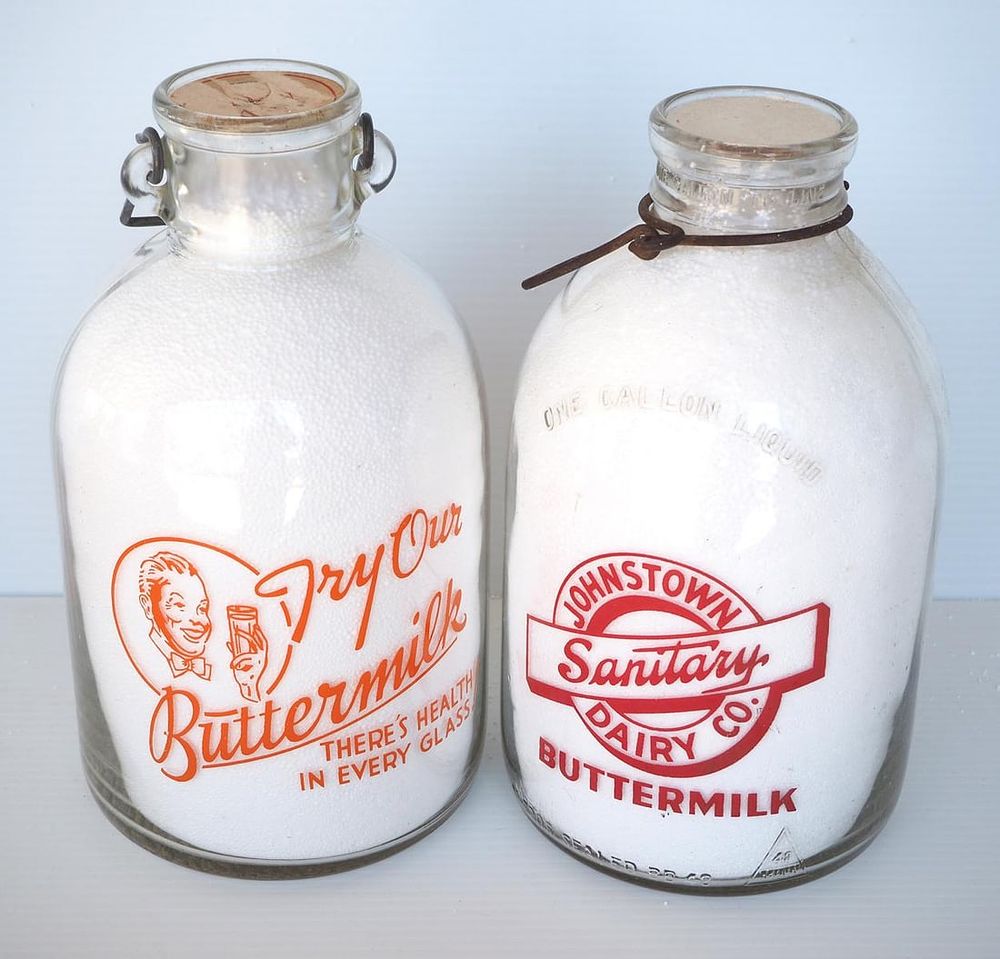 Lot 787: (2) 1 gallon milk bottles