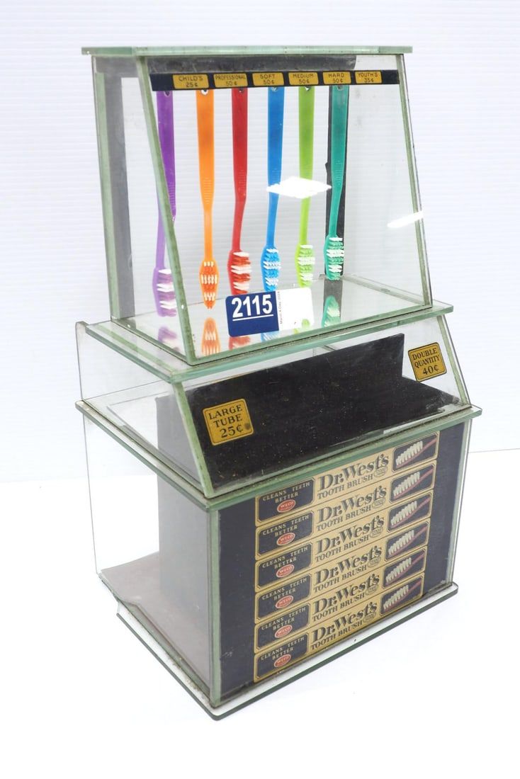 Lot 2115: Dr. West countertop tooth brush display