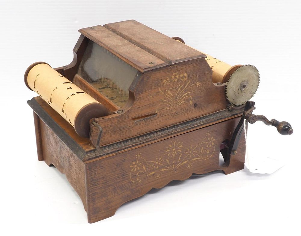 Lot 2194: Wooden hand crank music box