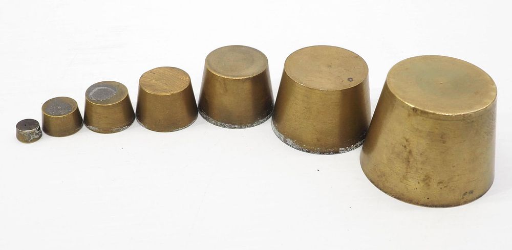 Lot 2266: Brass nested scale weight set