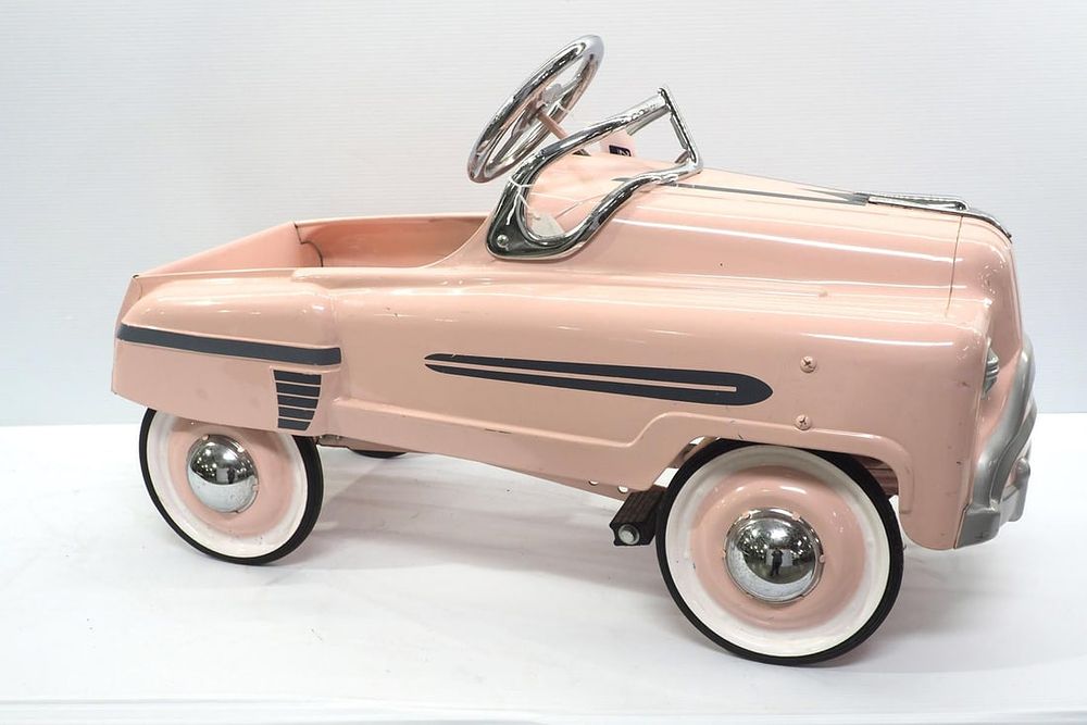 Lot 2286: Pedal car restored in pink color