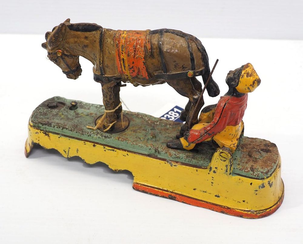 Lot 2381: Always Did Spise a Mule cast iron mechanical bank