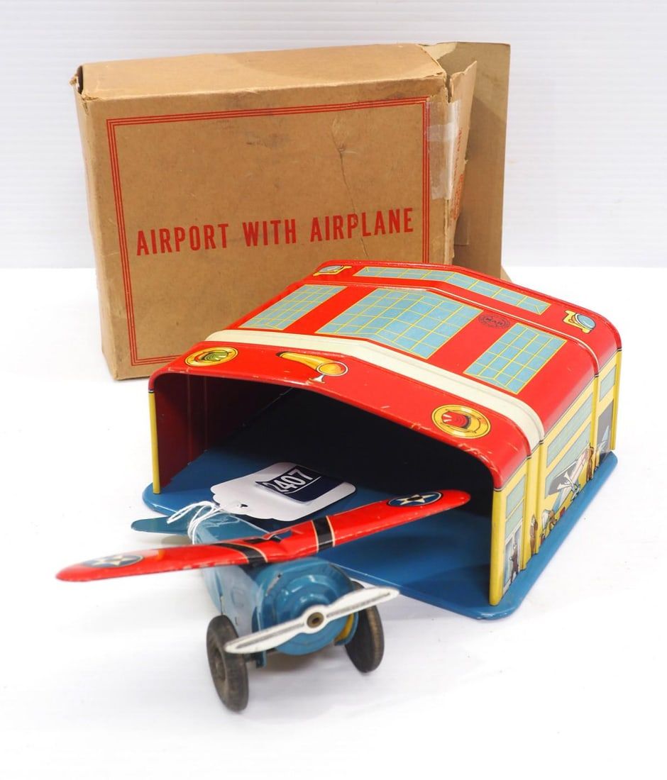 Lot 2407: Marx tin litho airport with airplane toy