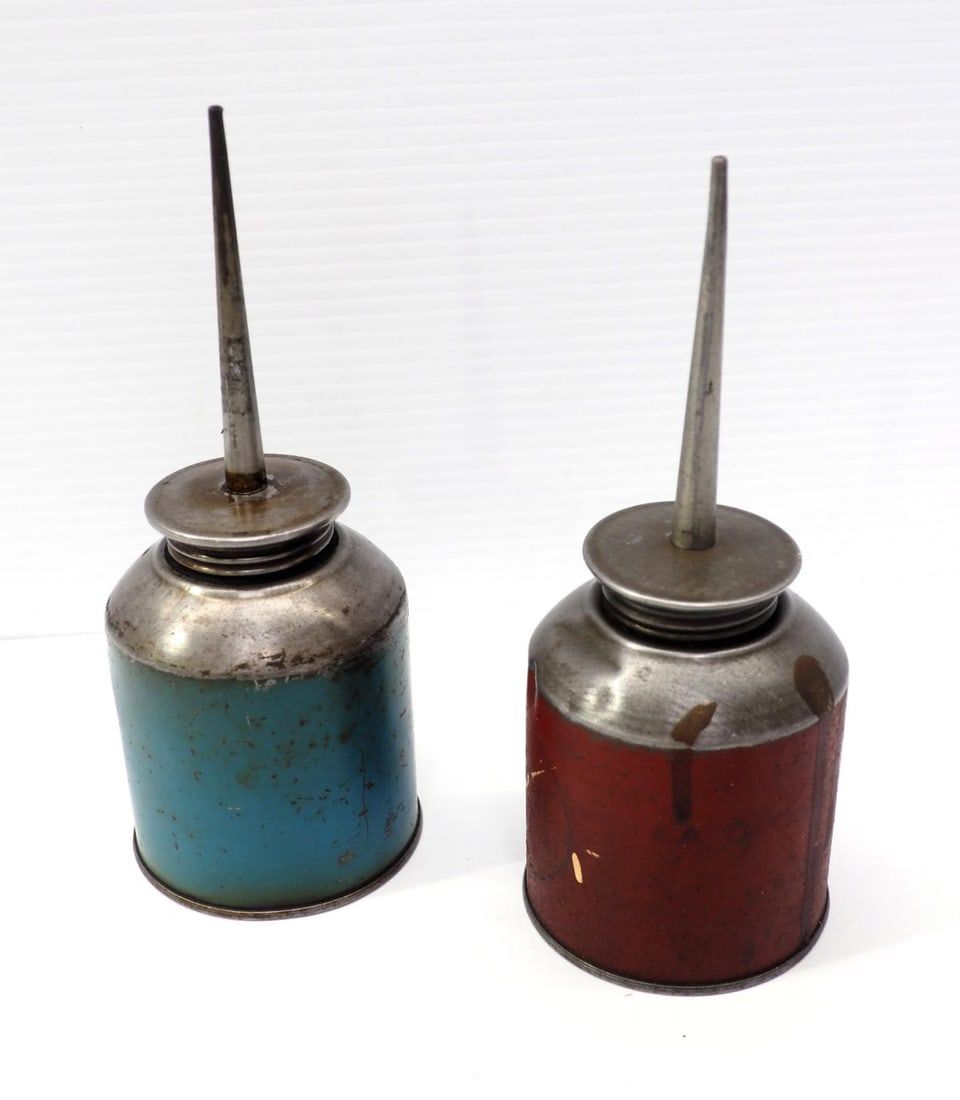 Lot 1048: Red & blue John Deere oilers