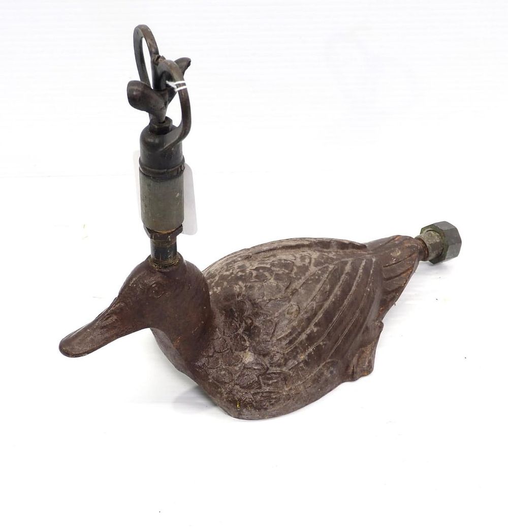 Lot 1100: Cast iron duck sprinkler