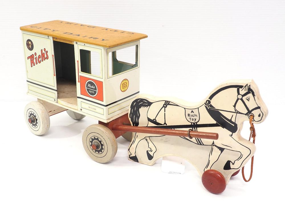 Lot 1127: Rich Toys horse-drawn City Dairy milk wagon toy
