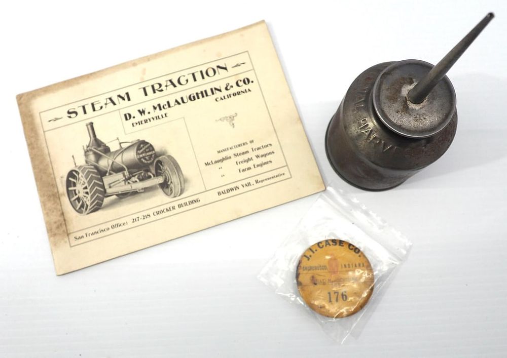 Lot 1256: JI Case employee badge, IH oil can, and brochure