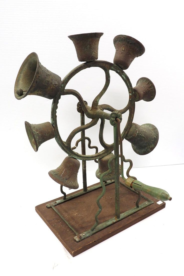 Lot 1339: Hand crank wheel with (8) brass bells