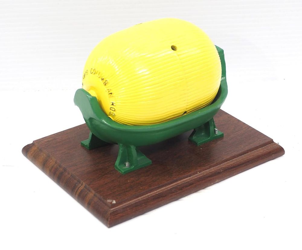 Lot 1712: Iron model of Columbian hog oiler