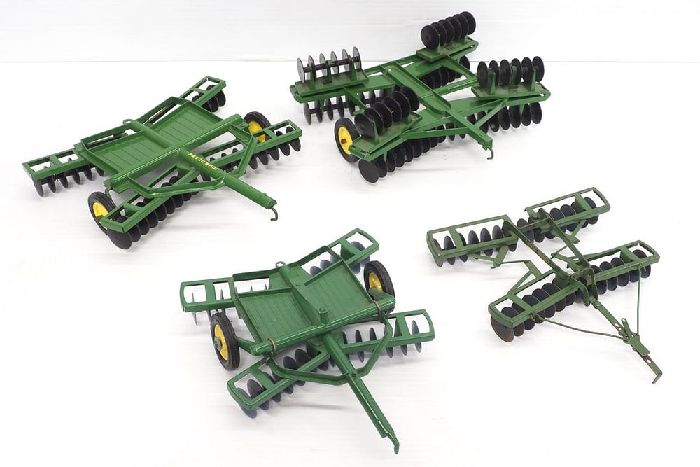 Lot 43: (4) Different John Deere Disks