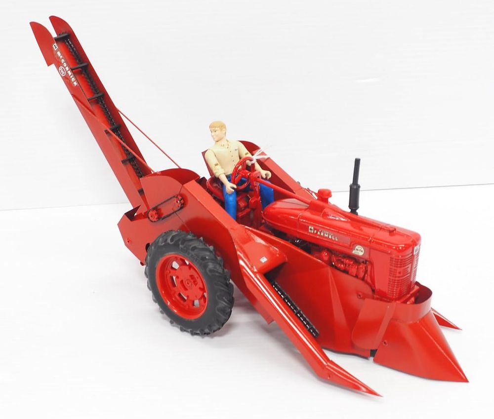 Lot 69: Farmall M-TA with Mounted 2-Row Picker