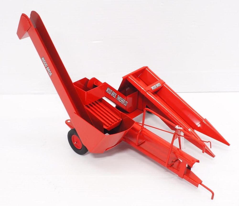 Lot 97: Custom Wood Bros. Pull-Behind 1-Row Picker