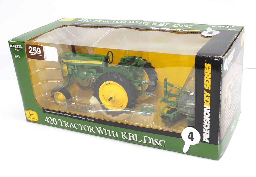 Lot 259: John Deere 420 Tractor with KBL Disc
