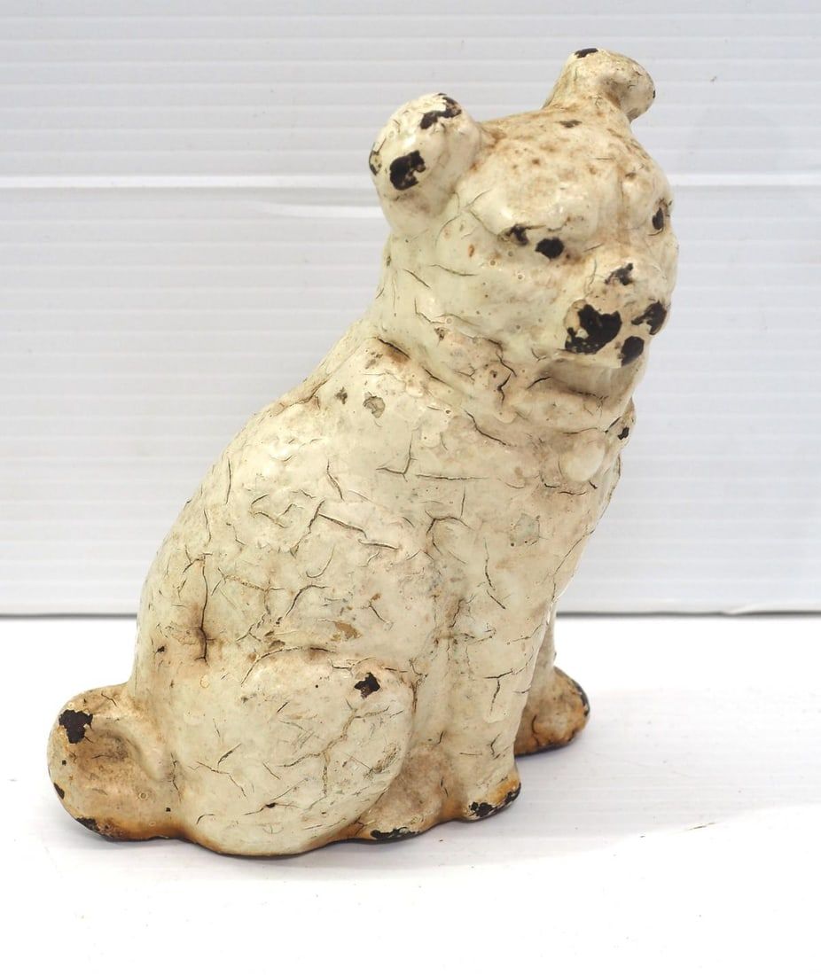 Lot 1021: Cast iron dog door stop