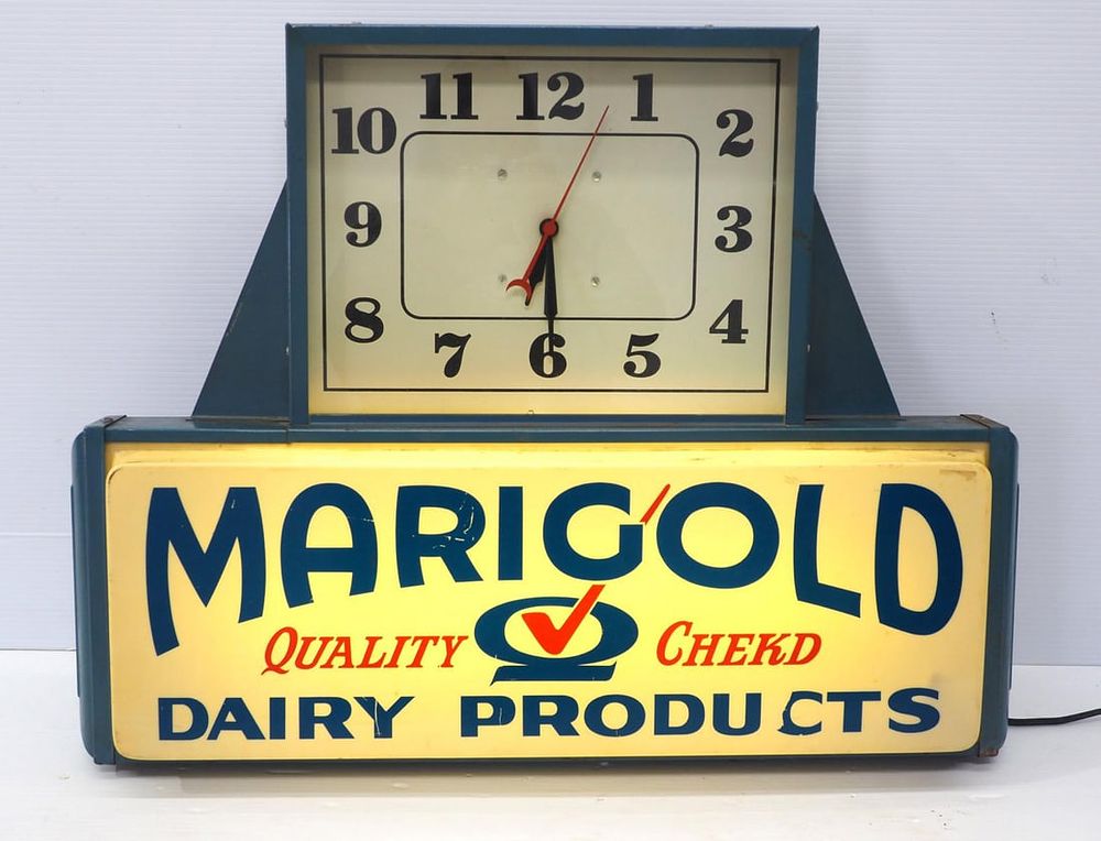 Lot 1027: Marigold Dairy Products clock/sign