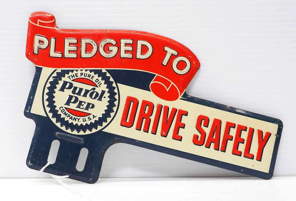 Lot 1044: Purol Pep 'Drive Safely' license plate topper