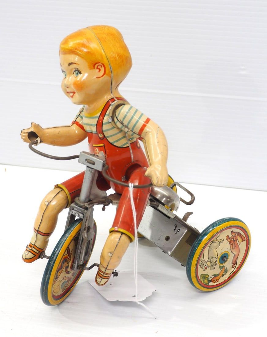 Lot 1052: Unique Art tin wind-up Kiddy Cyclist