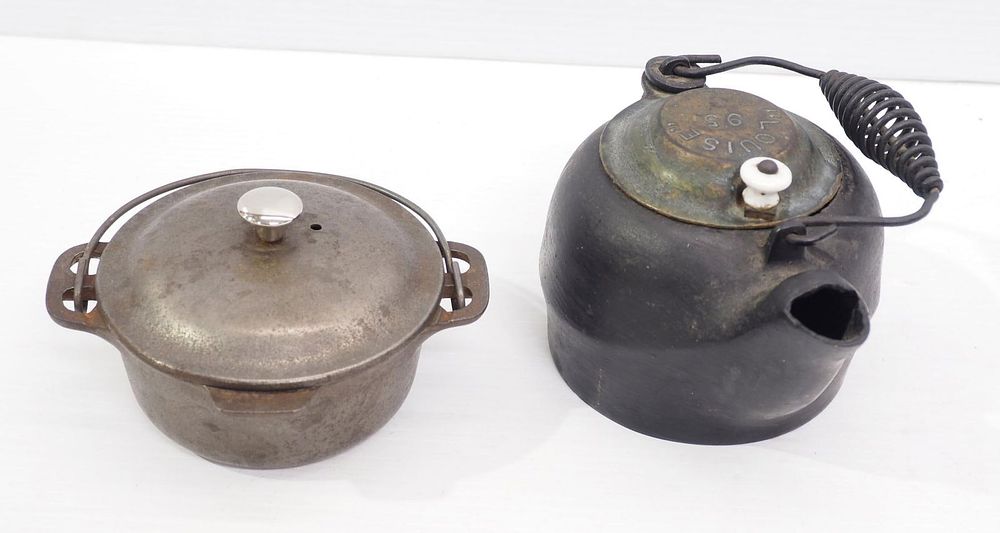 Lot 1058: Child's cast iron Dutch Oven and tea kettle