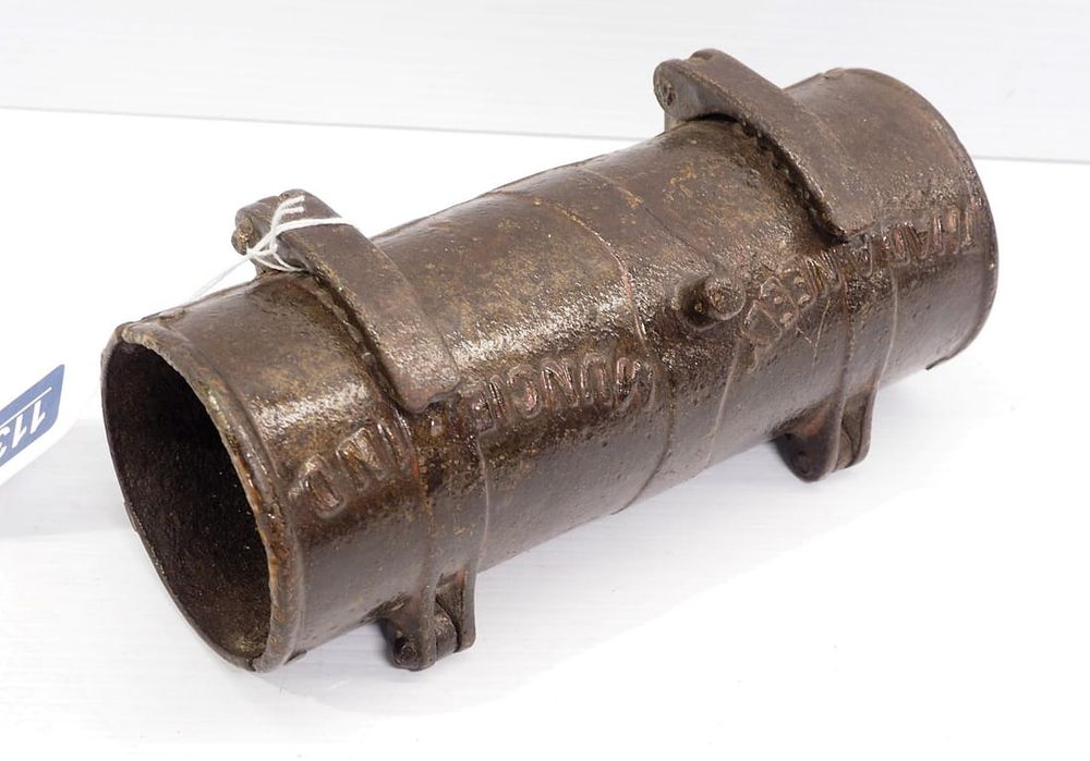 Lot 1132: Cast iron adjustable what is it?
