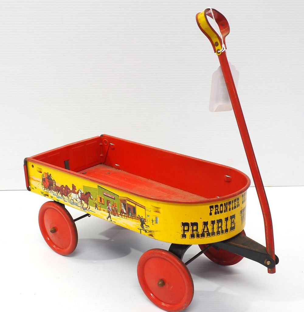 Lot 1135: Child's tin Prairie Wagon